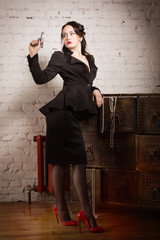 Noir film style woman in a black suit