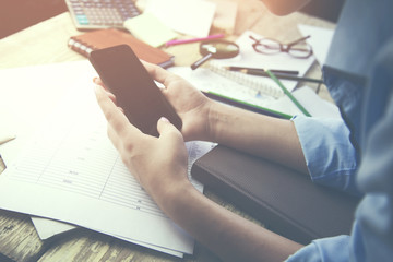 woman hand phone on working table