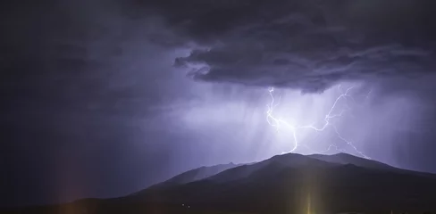 Foto op Plexiglas lightning on the mountain © ARAMYAN