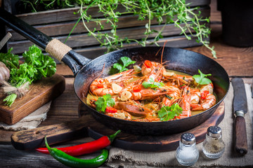 Tasty shrimps with garlic and red peppers
