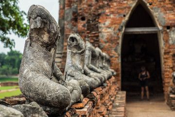 Fototapeta premium ancient Buddhist pagoda ruins at Chai Watthanaram temple