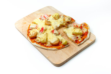Cheese pizza on wooden plate, isolated background