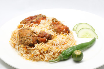 Chicken Biryani with chili and lime