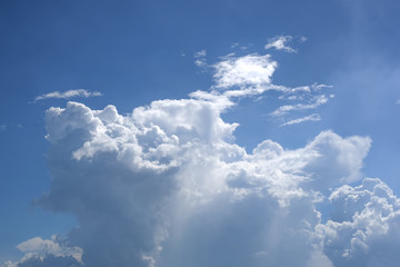 Naklejka na ściany i meble Blue sky with fluffy clouds fluffy