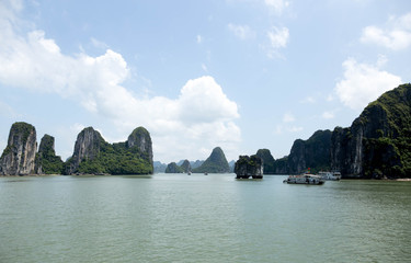 Fototapeta na wymiar Sea landscape with tourist boat in Halong Bay Vietnam