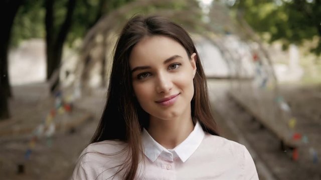 Natural Pretty Brunette Girl Portrait In Nature