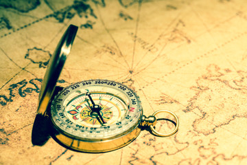 Fototapeta na wymiar Compass and vintage map