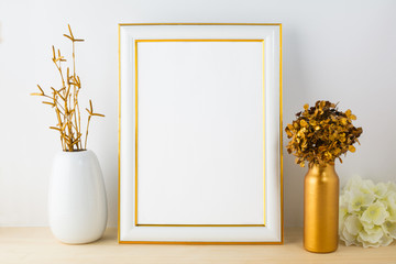 White fame mockup with white and golden vases