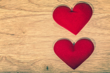 Fototapeta premium Valentine day background, red love heart on wooden background