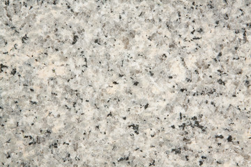 Unpolished granite texture. grey, black granite as background.
