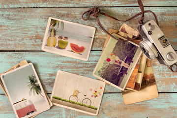 Photo album of journey honeymoon trip in summer on wood table. instant photo of retro camera - vintage and retro style