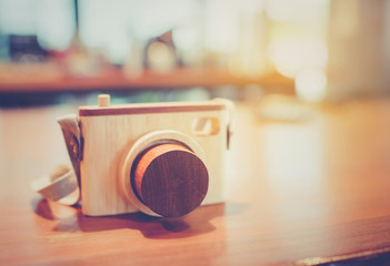 Vintage toy camera on table.