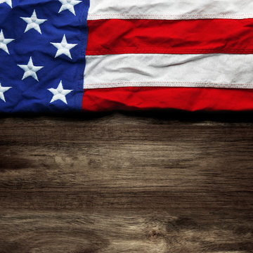 USA flag on wooden background