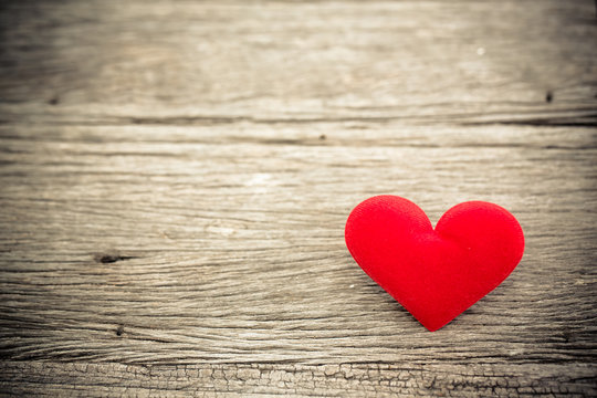 Love valentine heart on wood background