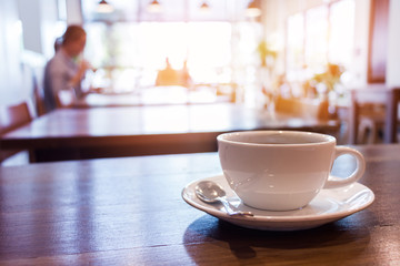 cup of coffee on table in cafe