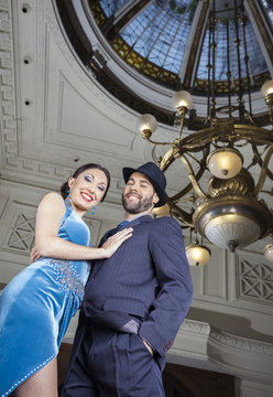 Portrait Of Tango Dancers Performing Below Cupola