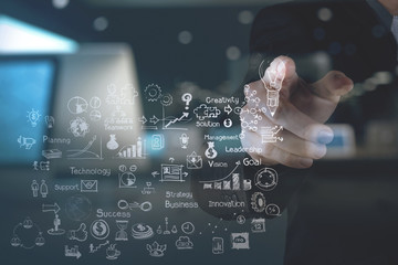 double exposure of businessman hand working with new modern comp