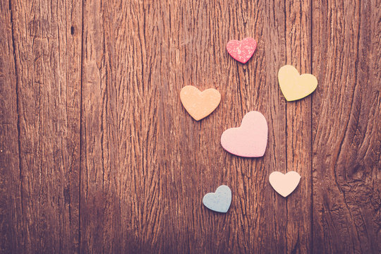 Valentine hearts on grunge wood background