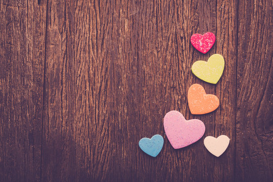 Valentine hearts on grunge wood background