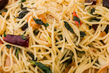 Close up fried spaghetti with chilli and ham