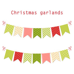 Festive retro garlands with bunting flags in traditional Christmas colors