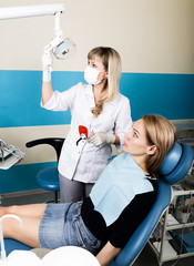 The reception was at the female dentist. Doctor examines the oral cavity on tooth decay. Caries...