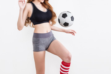 Sexy woman body with soccer ball