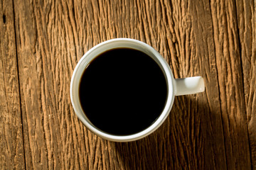 Hot black coffee on office table