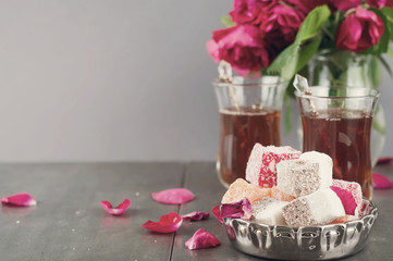Traditional arabic tea set and dried dates. Toned Photo
