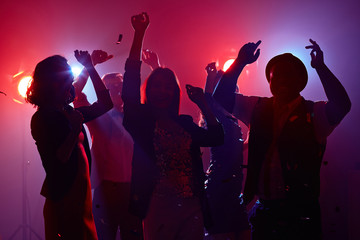 Obraz na płótnie Canvas Disco dancing in red light