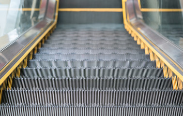 escalator,Up and down escalators in public building.
