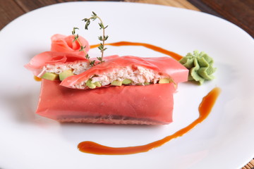 Oriental-style rolls with wasabi sauce