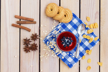 yogurt with blueberries and strawberry jam