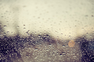 Rain drop o car front window. retro filter