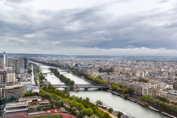 Fototapeta na wymiar View on rainy Paris from Eiffel tower.