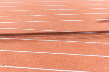 Jogging in a stadium with markings