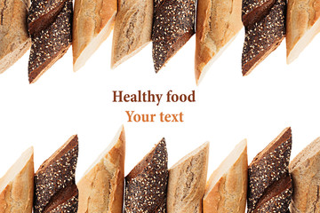 Cut baguette bread of different varieties on a white background. Rye, wheat and whole grain bread. Isolated. Decorative frame of bread. Food background. Copy space.