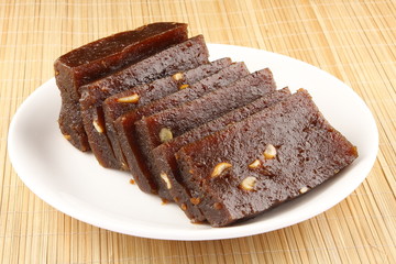 Homemade Indian Sliced black Halwa with cashews. 