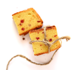 Pieces of Dessert cake tied up with rope