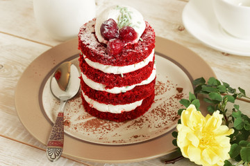 red cake with cherry