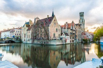 Naklejka na ściany i meble Bruges, Belgium, buildings and canals.