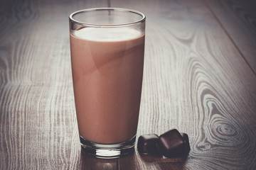 glass of chocolate milkshake on the table