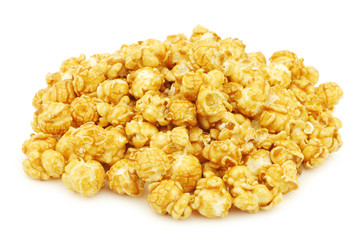 pieces of caramel popcorn on a white background