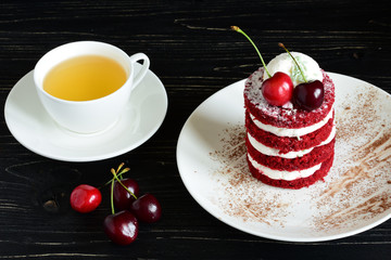 red cake with cherry