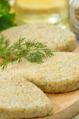 Raw fish cutletes prepared for cook
