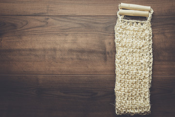 bound bast with wooden grips on the table