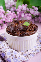 Homemade chocolate cheese souffle on pink background