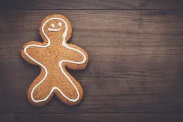 gingerbread man cookie on the wooden background