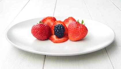 a pile of blackberries and strawbeeries