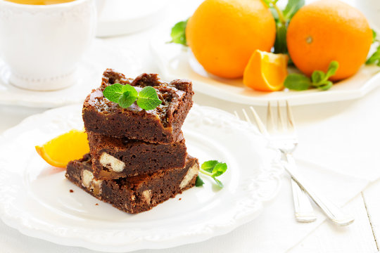 Delicious chocolate brownie with caramel and orange.